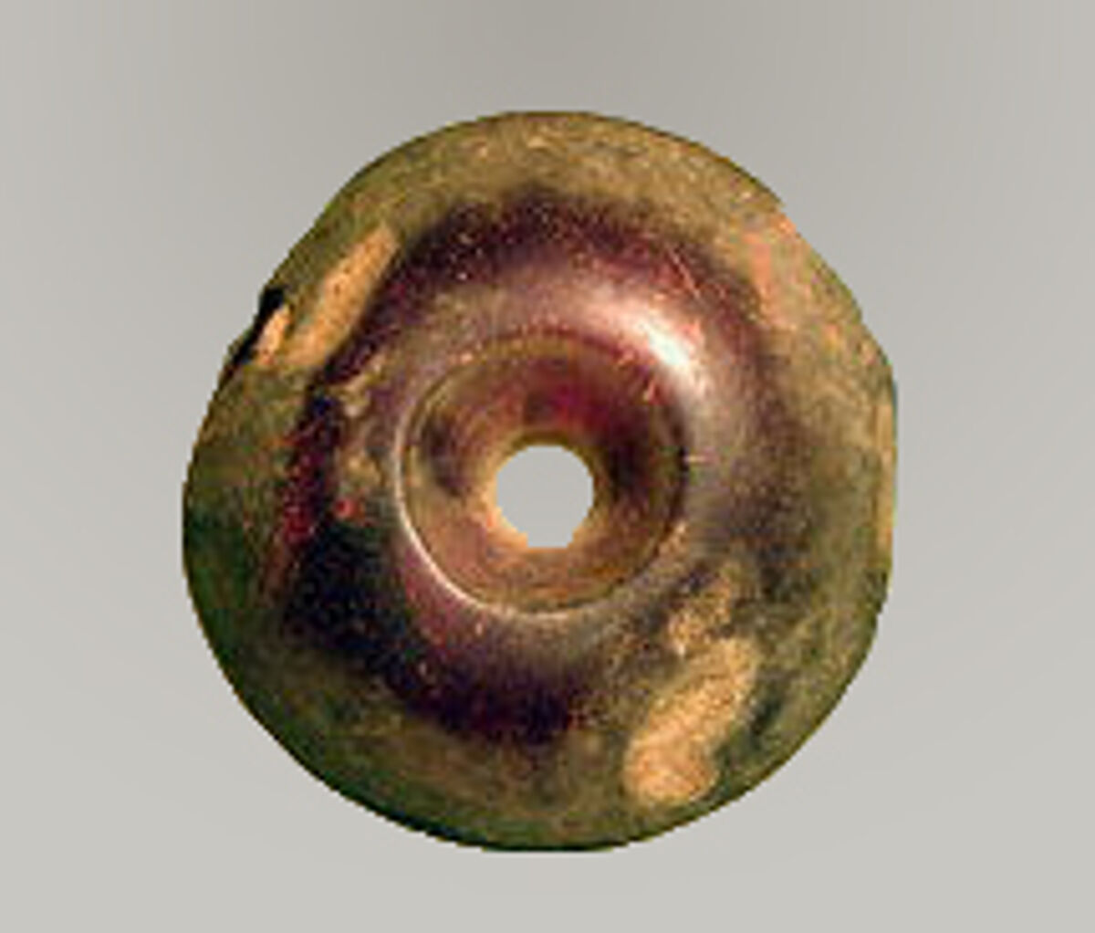 Pierced disk, Amber, Italic 