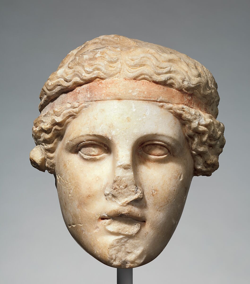 Marble head of a deity wearing a Dionysiac fillet, Marble, Roman 