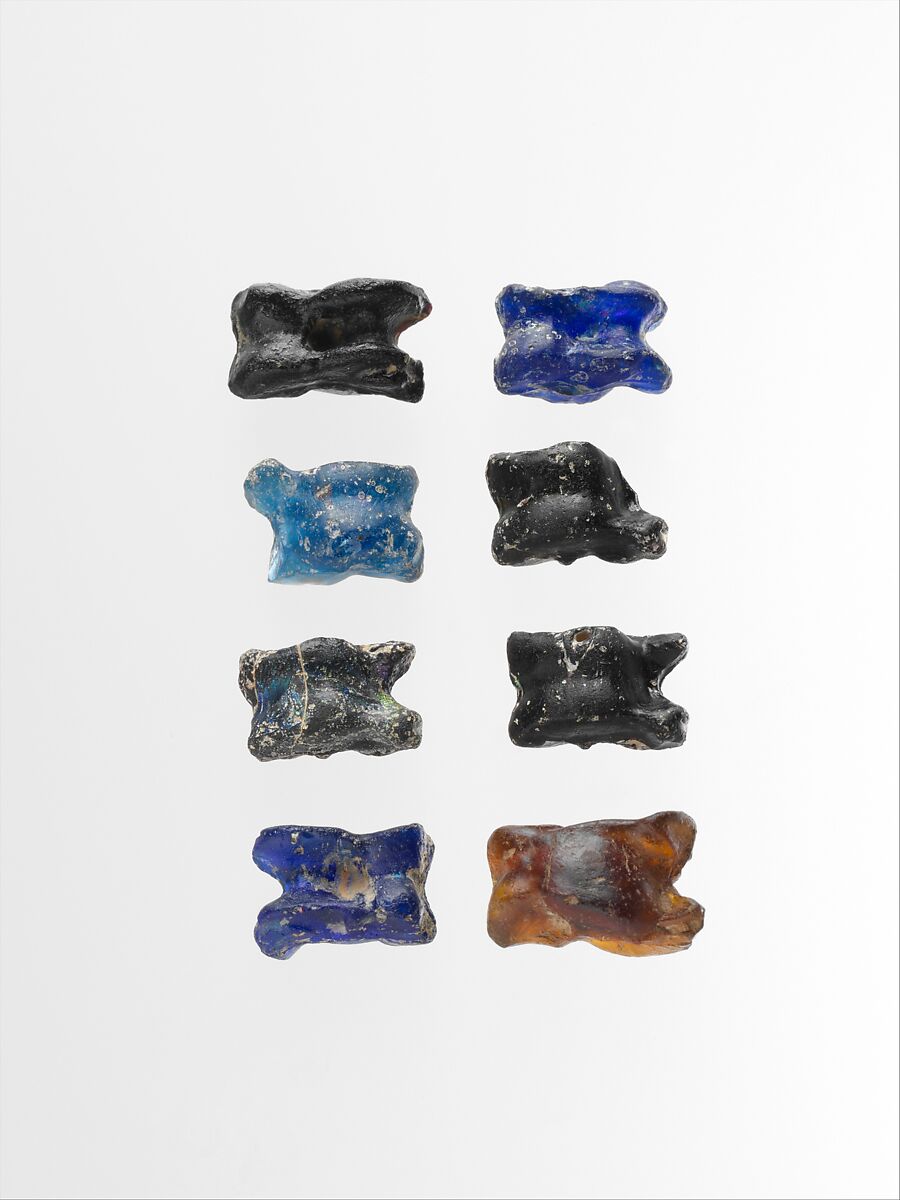 Group of eight glass astragali (knucklebones), Glass, Greek 