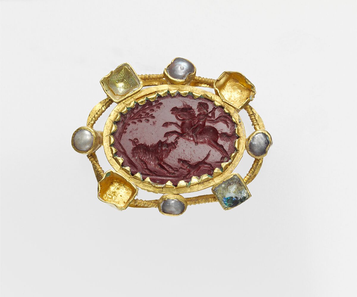 Jasper intaglio in a gold mount set with pearls and glass