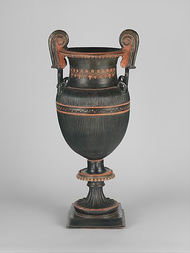 Pair of terracotta volute-kraters (vases for mixing wine and water) with stands