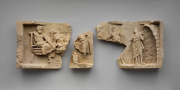 Fragment of a limestone relief with standing figure, Limestone, Greek, South Italian, Tarentine