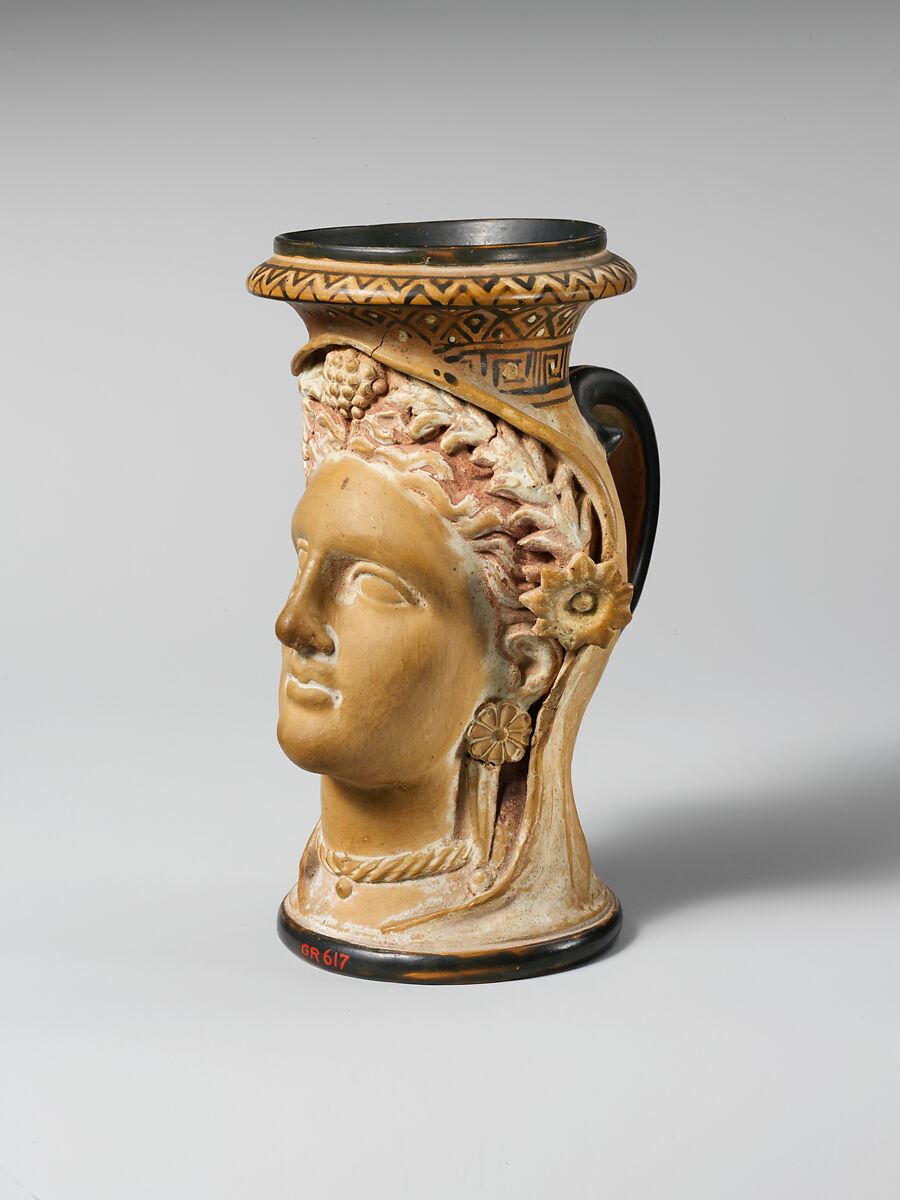 Terracotta oinochoe (jug) in the form of a woman's head, Terracotta, Etruscan 