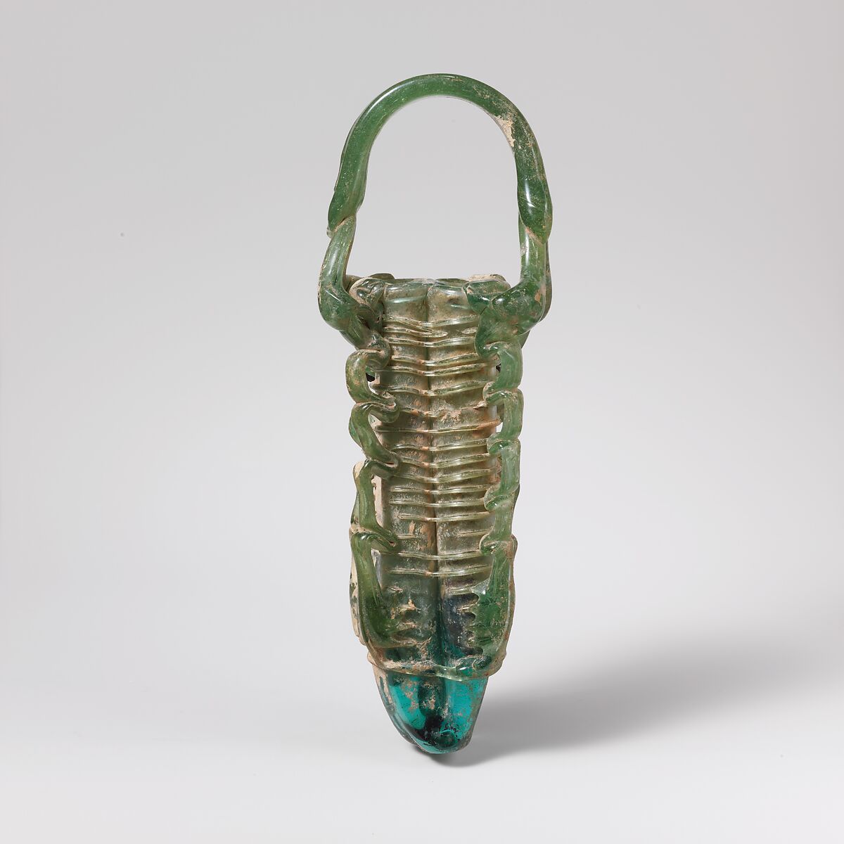 Glass cosmetic flask with four compartments (kohl tube), Glass, Roman, Syrian 
