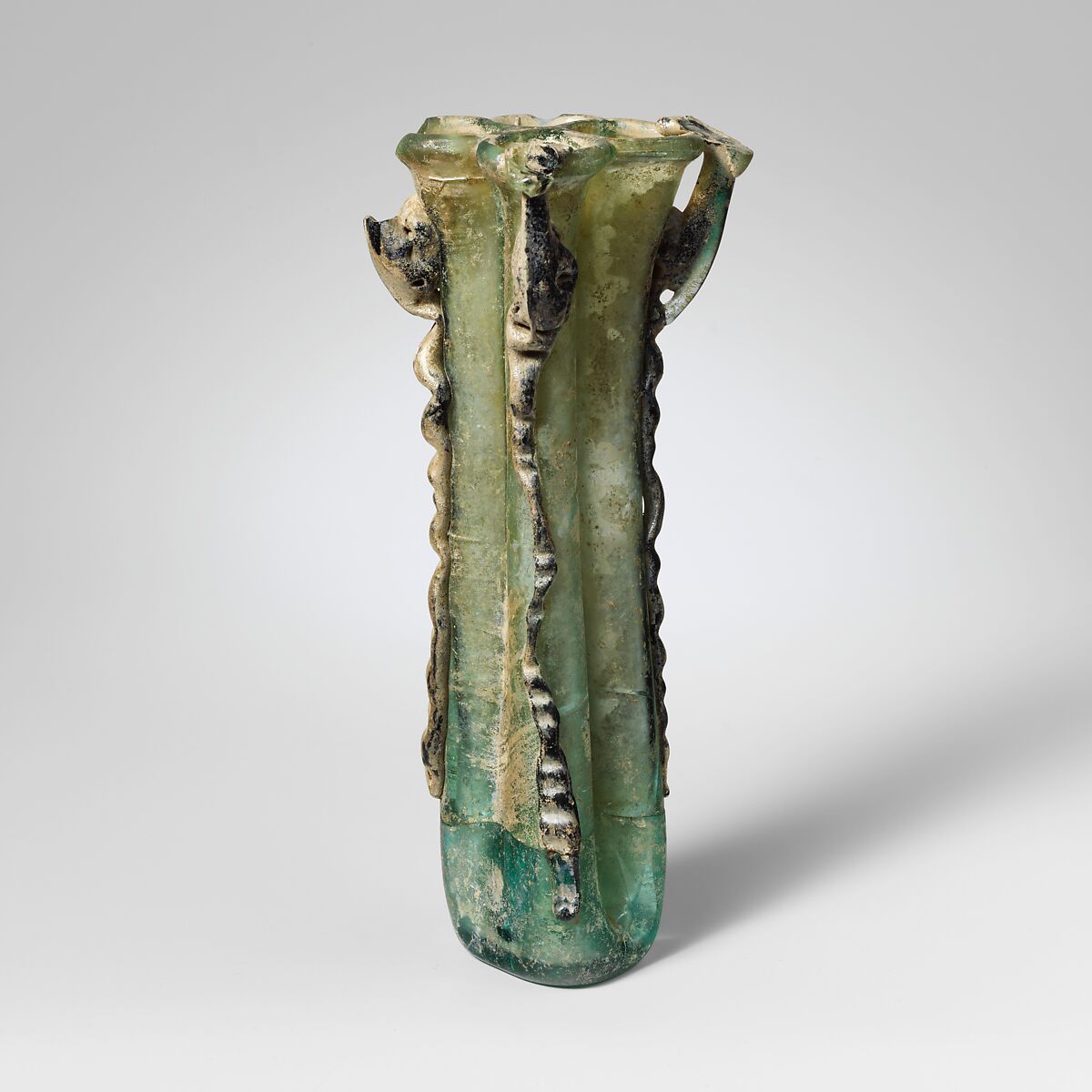 Glass cosmetic flask with four compartments (kohl tube), Glass, Roman, Palestine 