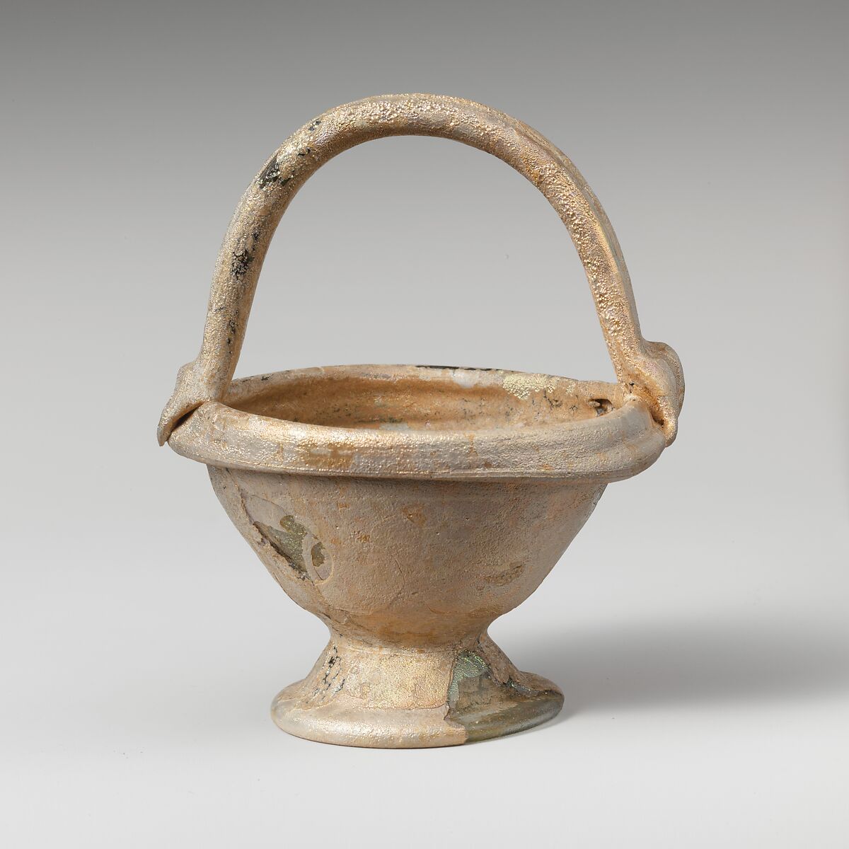 Glass bowl with basket handle, Glass, Roman, Syrian 