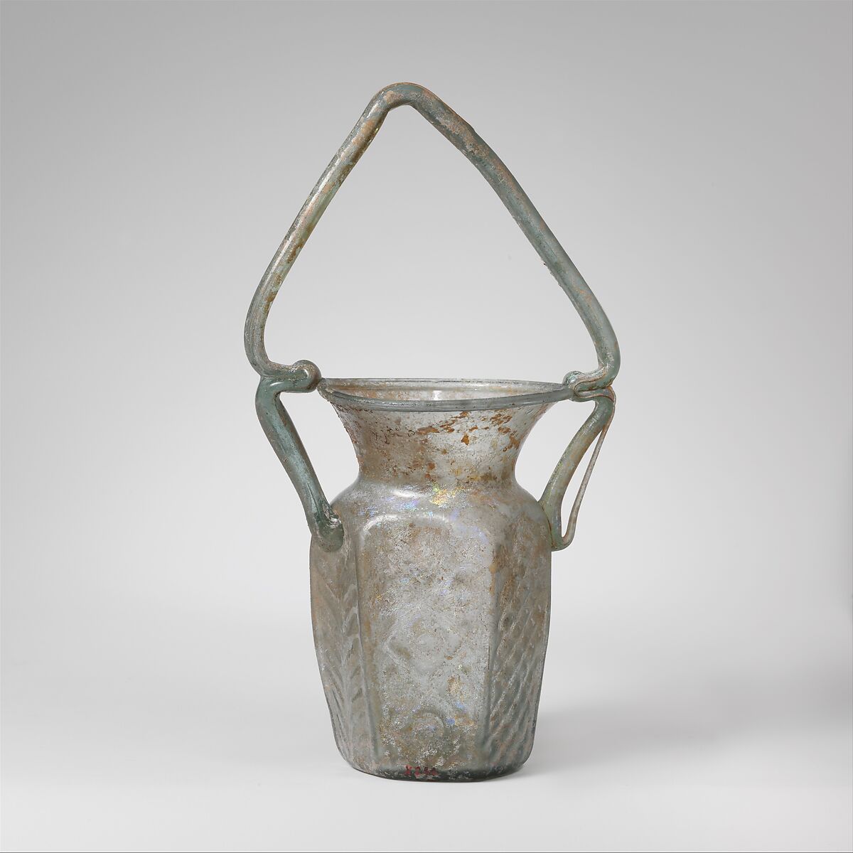 Glass hexagonal jar with basket handle, Glass, Roman, Syrian 