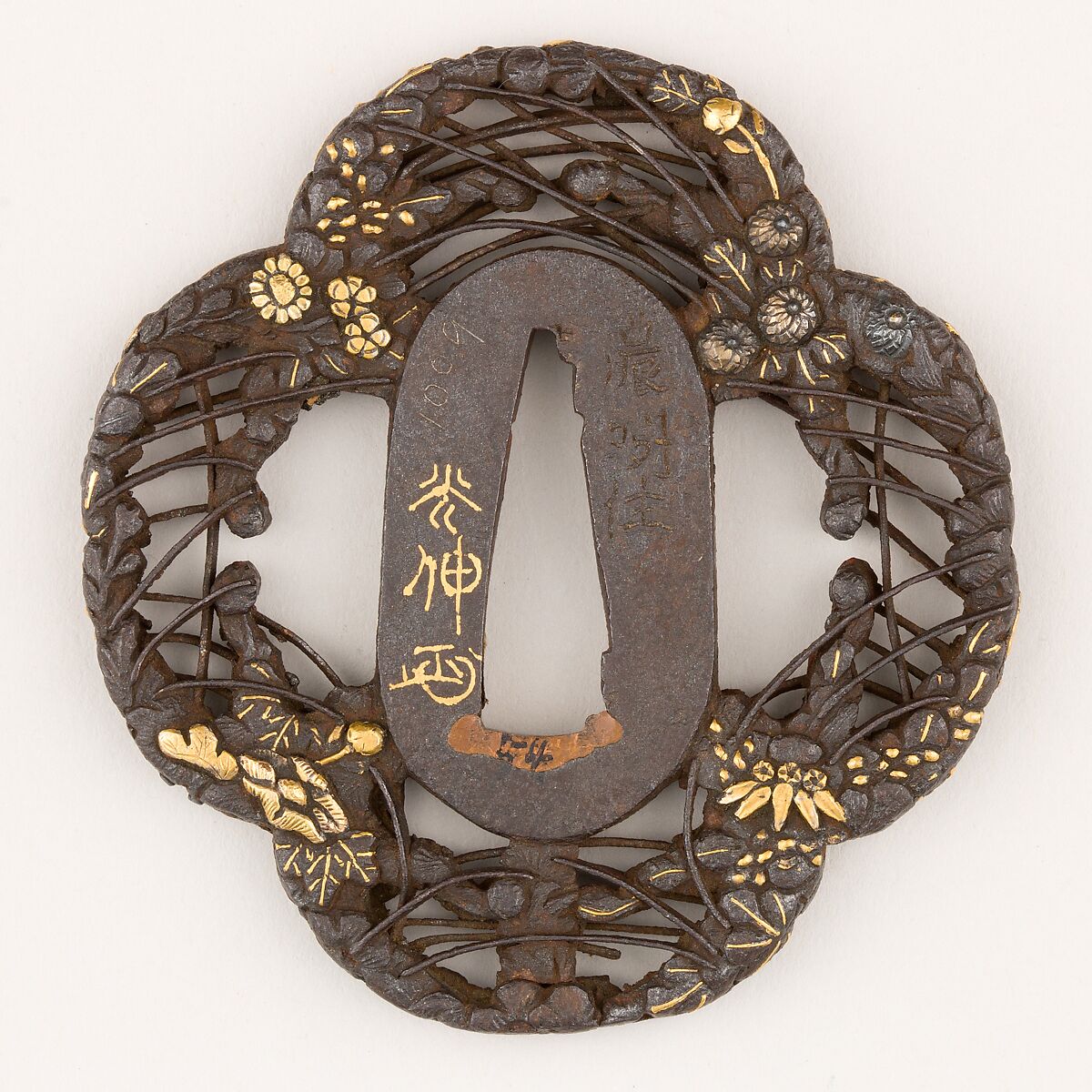Sword Guard (<i>Tsuba</i>) With the Motif of Autumnal Vegetation (秋草透鐔), Mitsunobu (Japanese, Mino province, active 17th century), Iron, gold, copper, silver-copper alloy (<i>shibuichi</i>), Japanese