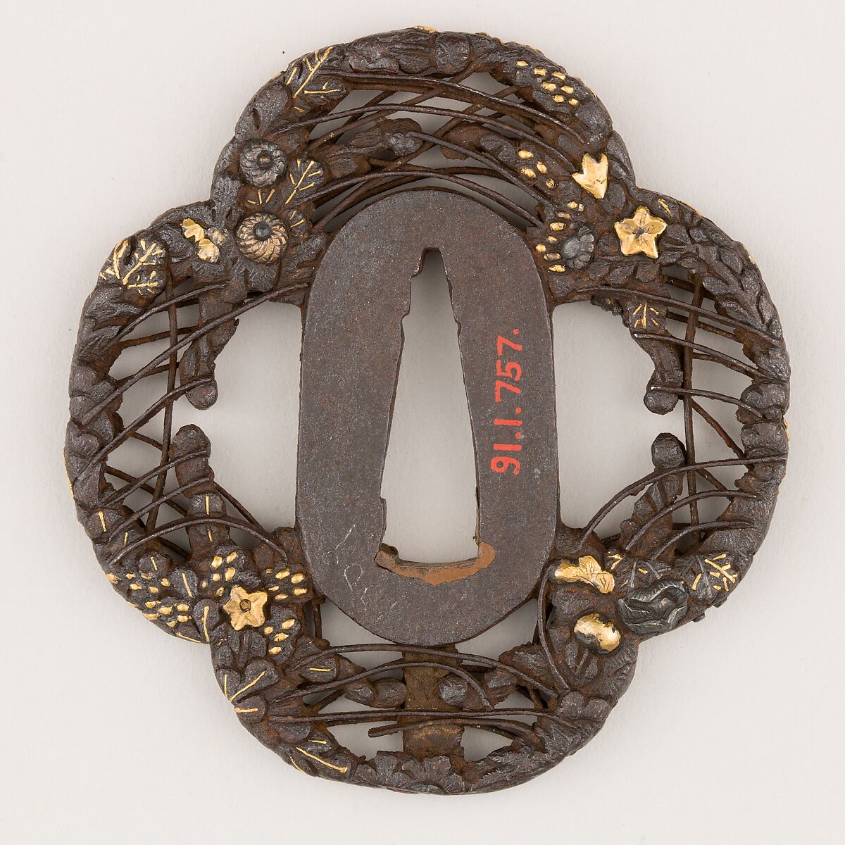 Sword Guard (<i>Tsuba</i>) With the Motif of Autumnal Vegetation (秋草透鐔), Mitsunobu (Japanese, Mino province, active 17th century), Iron, gold, copper, silver-copper alloy (<i>shibuichi</i>), Japanese