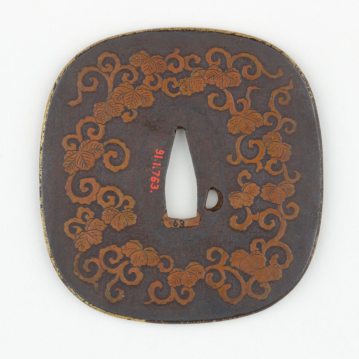 Sword Guard (<i>Tsuba</i>) Depicting Dragon and Paulownia Leaves With Tendrils (龍と桐唐草図鐔), Iron, copper, gold, Japanese