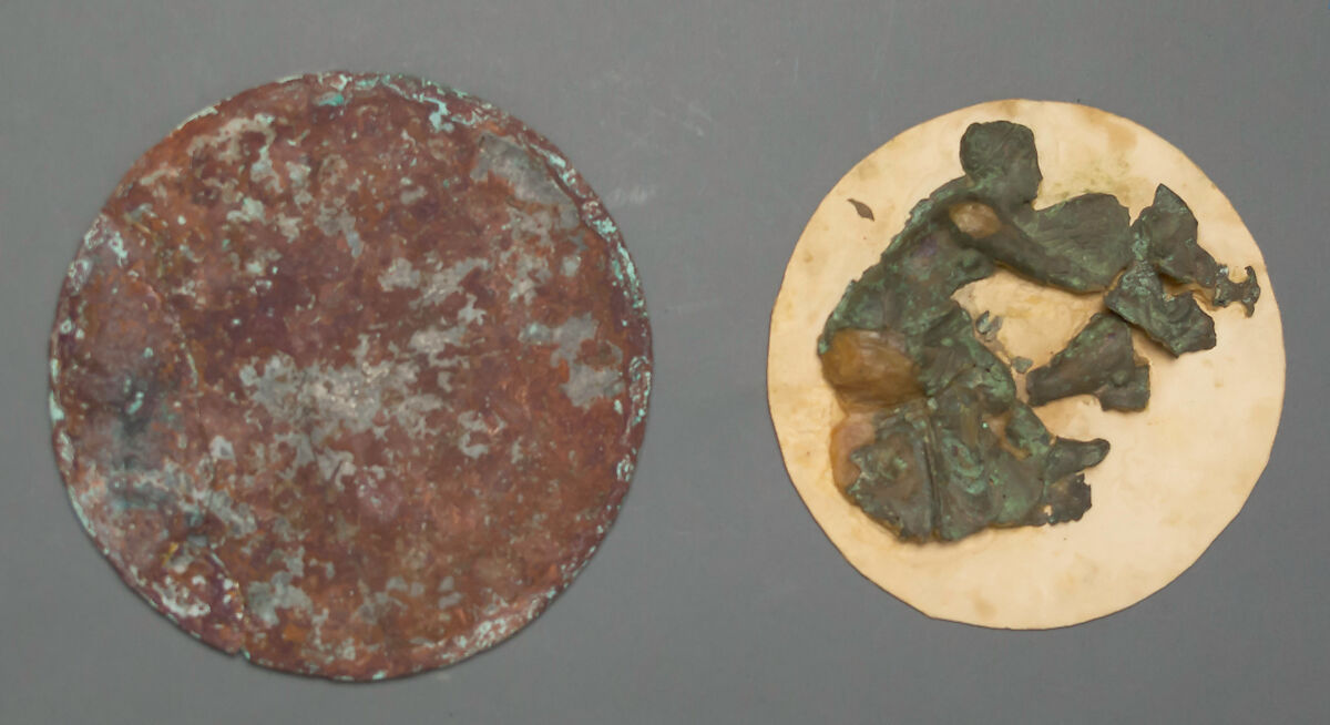 Mirror cover, fragmentary, Bronze 