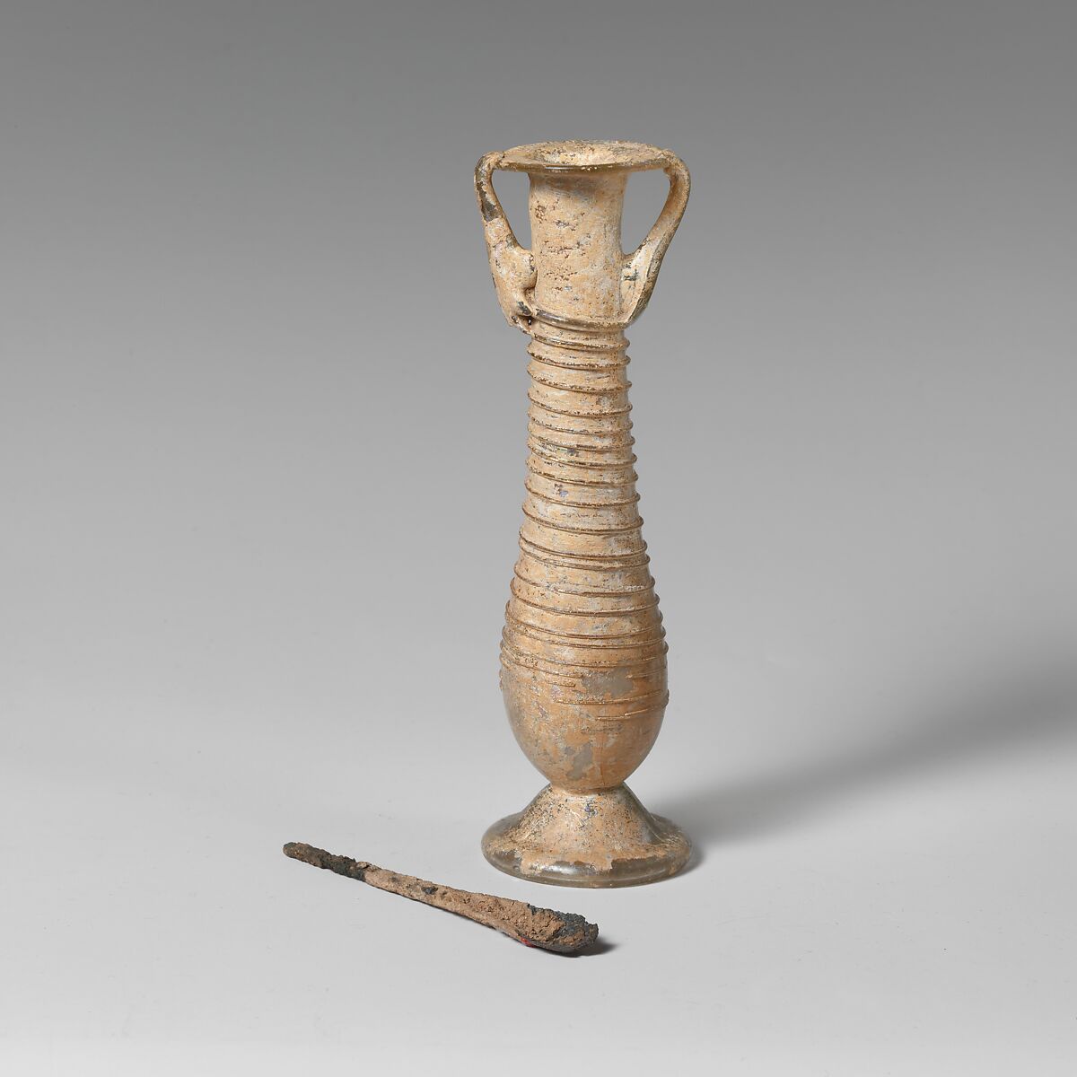 Glass cosmetic flask (kohl tube), Glass, bronze, Roman, Syrian 