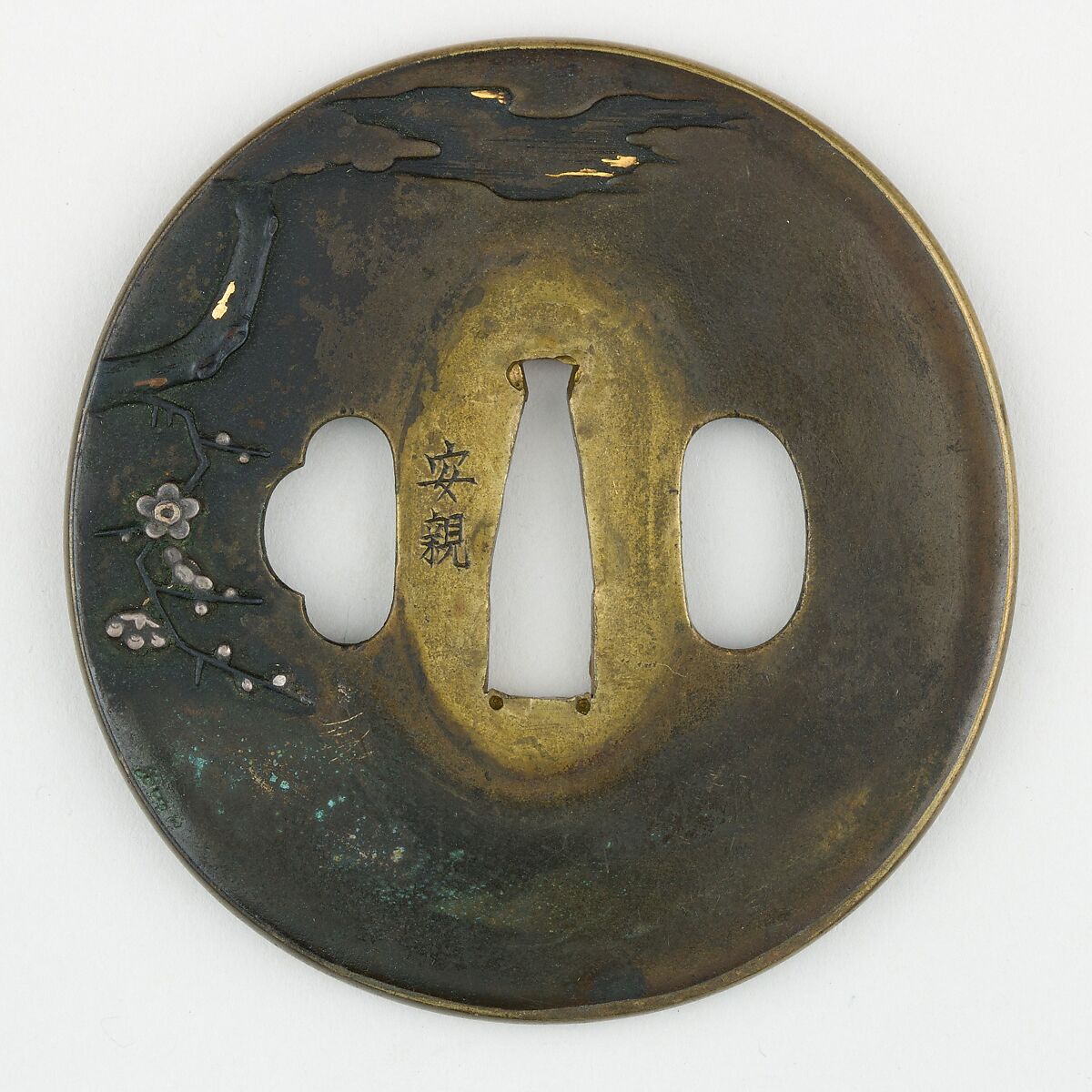 Sword Guard (<i>Tsuba</i>) Depicting Horned Owl in Plum Tree (梅樹に木菟図鐔), Brass, copper-gold alloy (shakudō), gold, silver, copper, Japanese