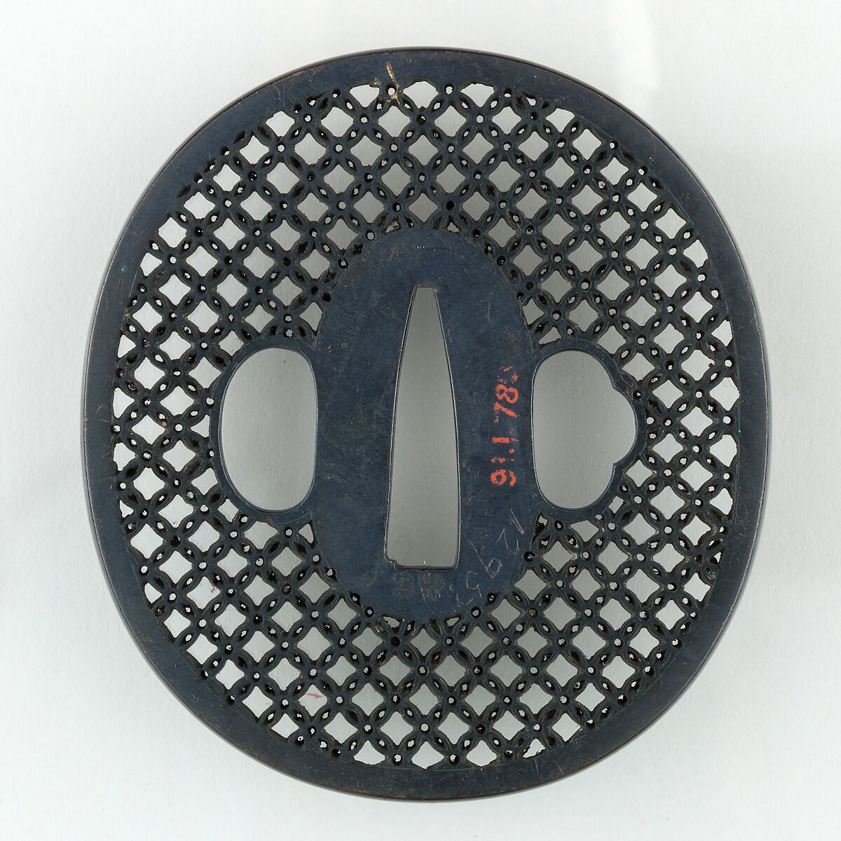 Sword Guard (<i>Tsuba</i>) With the Motif of Connected <i>Shippō</i> Elements (七宝繋ぎ透鐔), Copper-gold alloy (shakudō), Japanese 