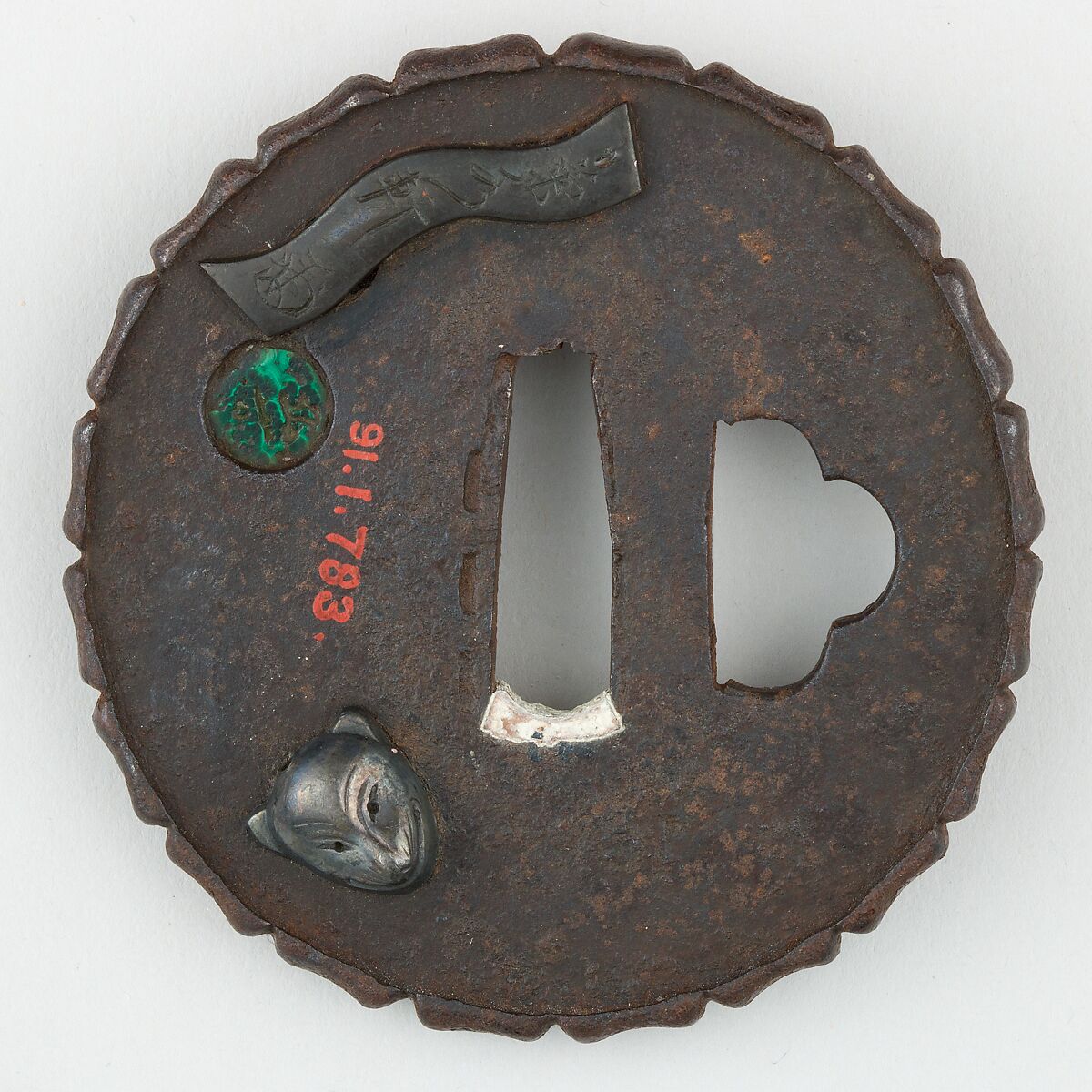 Sword Guard (<i>Tsuba</i>) Depicting an Arrangement of Masks (面散図鐔), Iron, copper, silver, jade, gold, copper-gold alloy (shakudō), Japanese