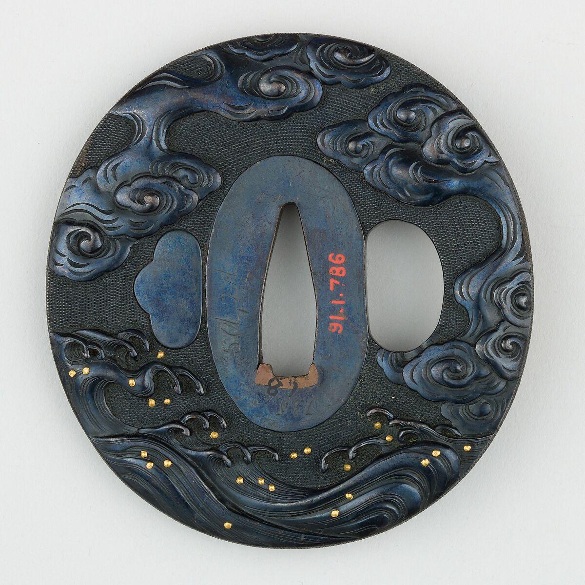 Sword Guard (<i>Tsuba</i>) Depicting Dragon Between Waves (波龍図鐔), Copper-gold alloy (shakudō), gold, copper, Japanese