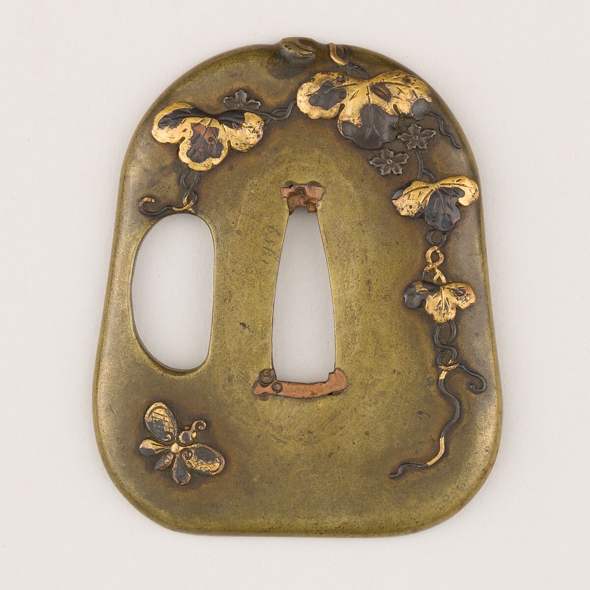 Sword guard (<i>Tsuba</i>) With the Motif of Paulownia Leaves, Tendrils, and Butterfly (蝶に桐唐草図鐔), Copper alloy (sentoku), gold, copper, copper-gold alloy (shakudō), Japanese 