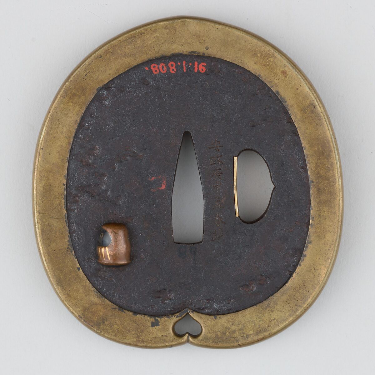 Sword guard (<i>Tsuba</i>) Depicting Head on Stick Toy (首人形図鐔), Iron, brass, gold, copper, copper-gold alloy (shakudō), Japanese