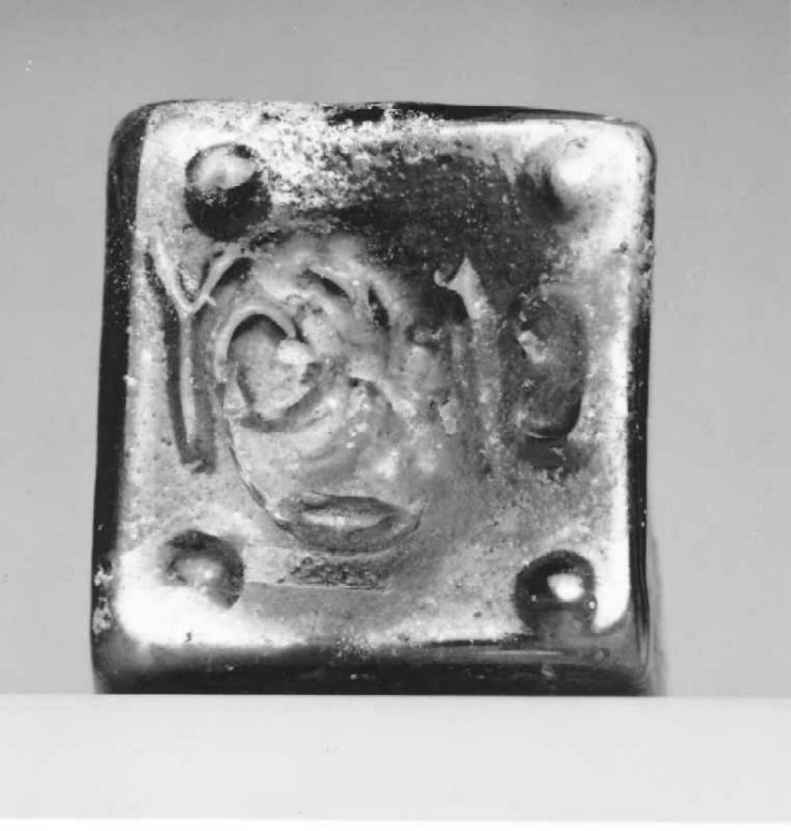 Glass square bottle with base inscription, Glass, Roman