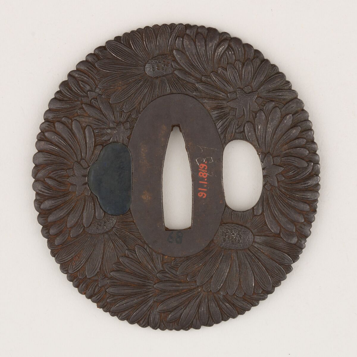 Sword guard (<i>Tsuba</i>) With Chrysanthemum Motif (菊花図鐔), Masayoshi (Japanese, active late 18th century), Iron, copper-gold alloy (shakudō), Japanese
