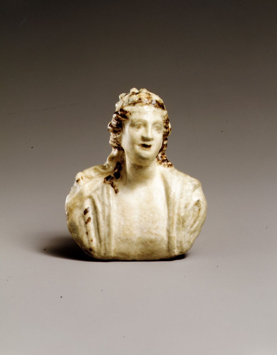 Faience appliqué with a bust of Dionysos, Faience, Greek 