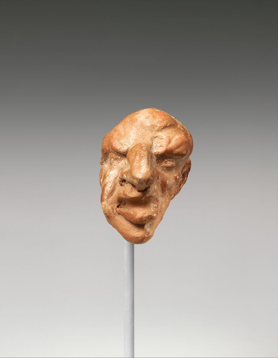 Terracotta head of a male dwarf, Terracotta, Greek