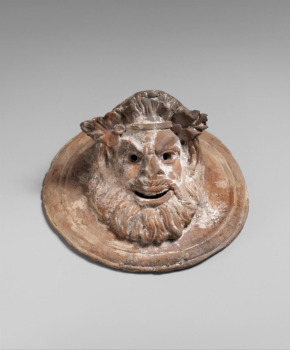 Terracotta roundel with mask of Pan, Terracotta, Greek 