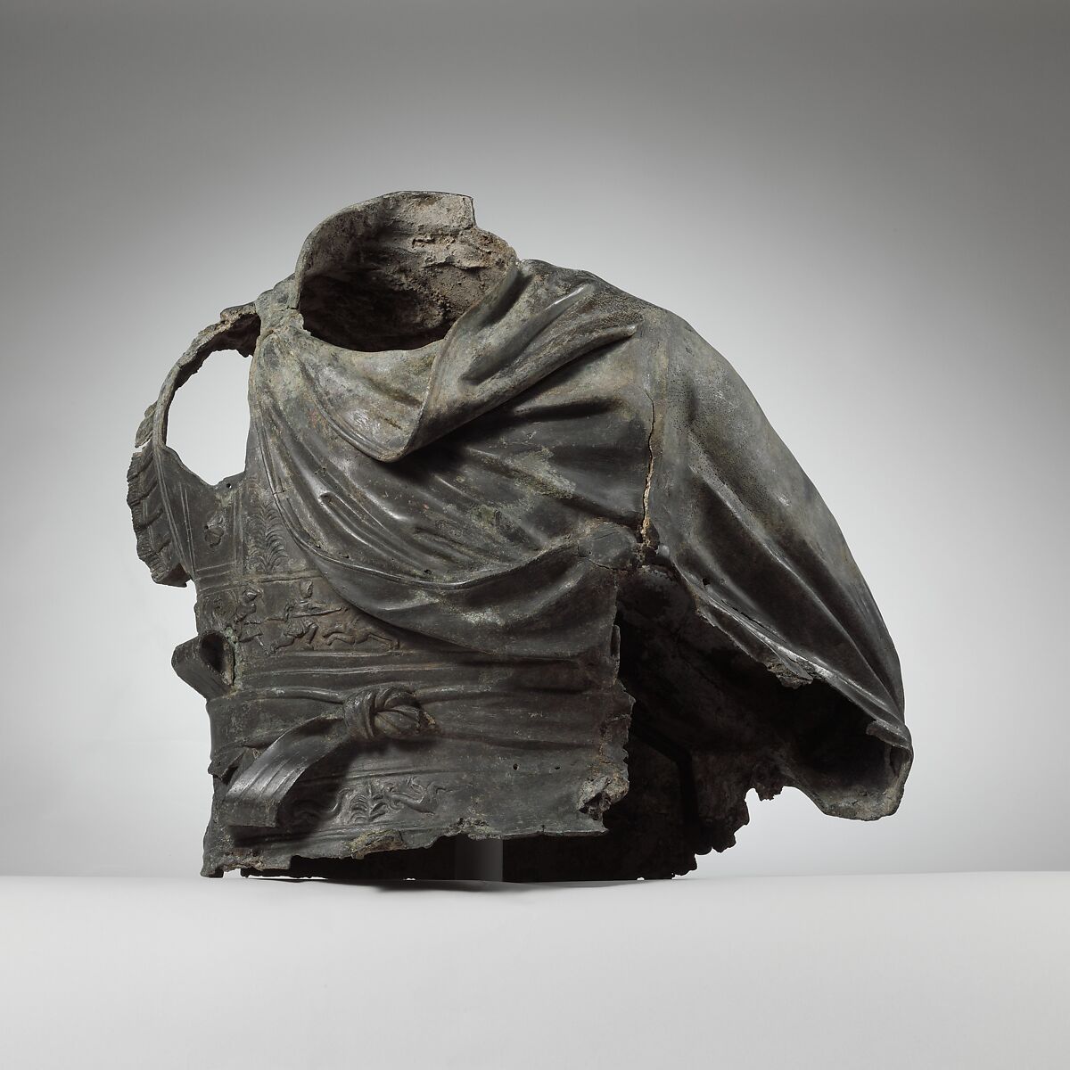 Bronze torso from an equestrian statue wearing a cuirass, bronze, Greek or Roman