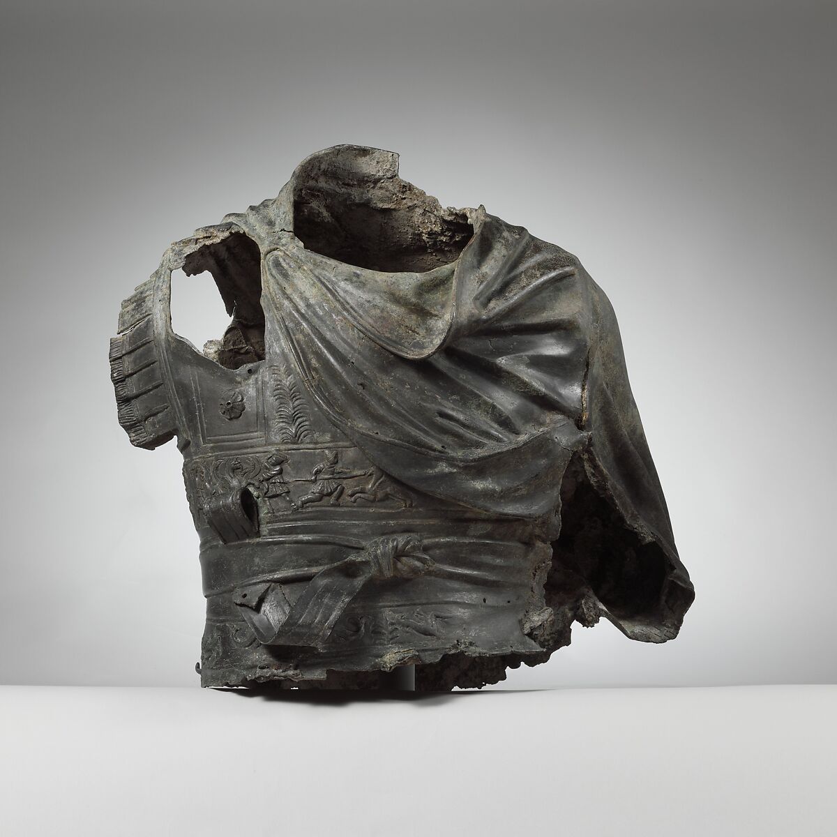 Bronze torso from an equestrian statue wearing a cuirass, bronze, Greek or Roman