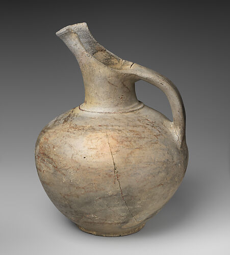 Terracotta spouted jug