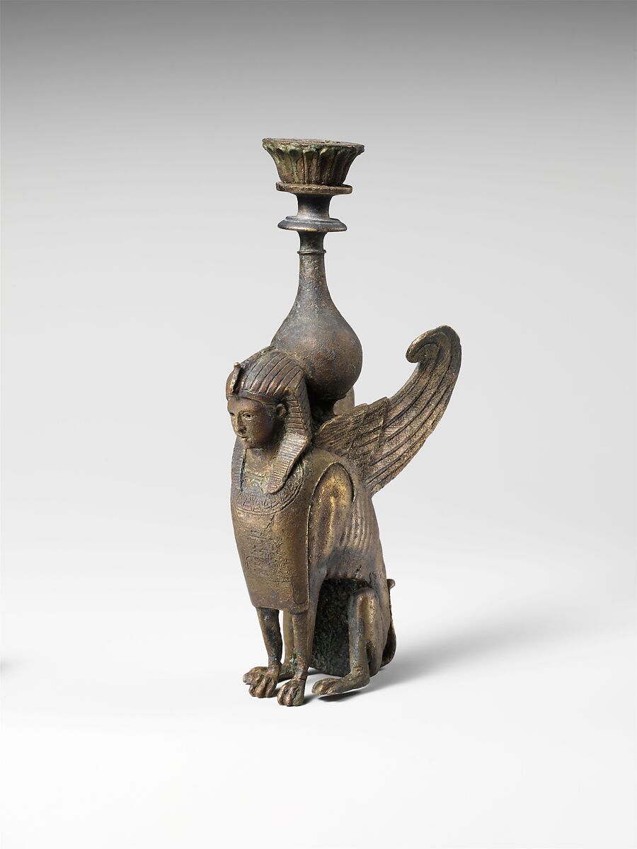 Bronze ornament in the form of a seated male sphinx, bronze, Roman 