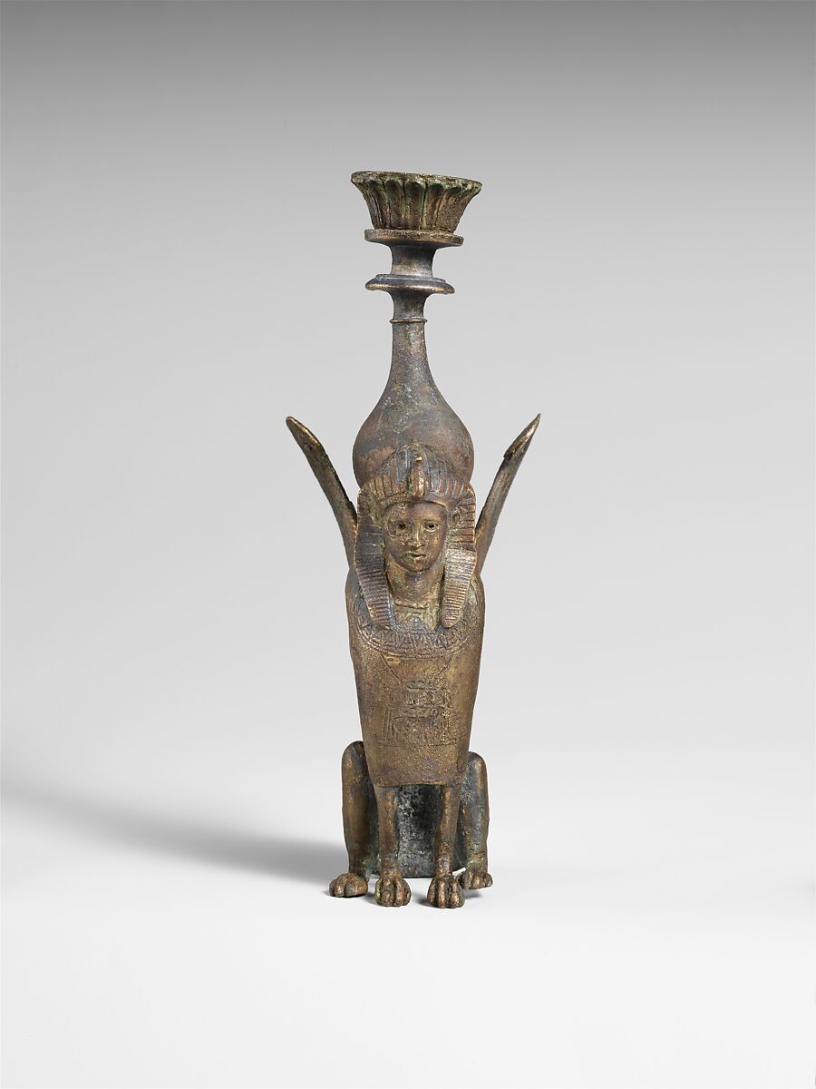 Bronze ornament in the form of a seated male sphinx, bronze, Roman