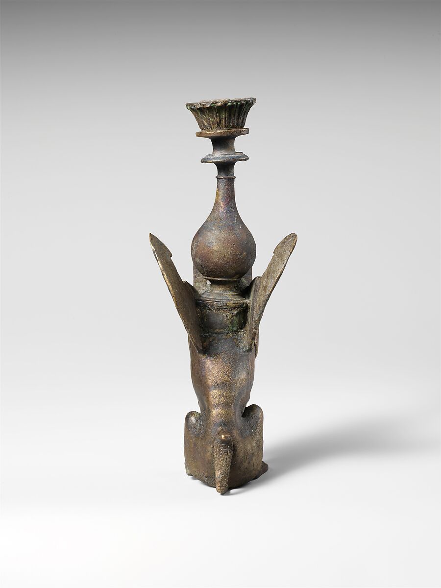 Bronze ornament in the form of a seated male sphinx, bronze, Roman