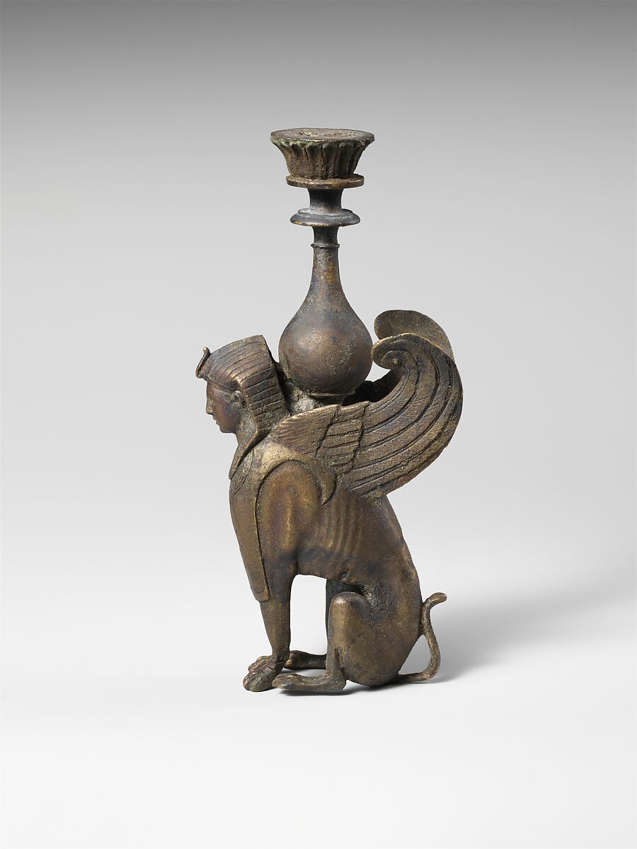 Bronze ornament in the form of a seated male sphinx, bronze, Roman