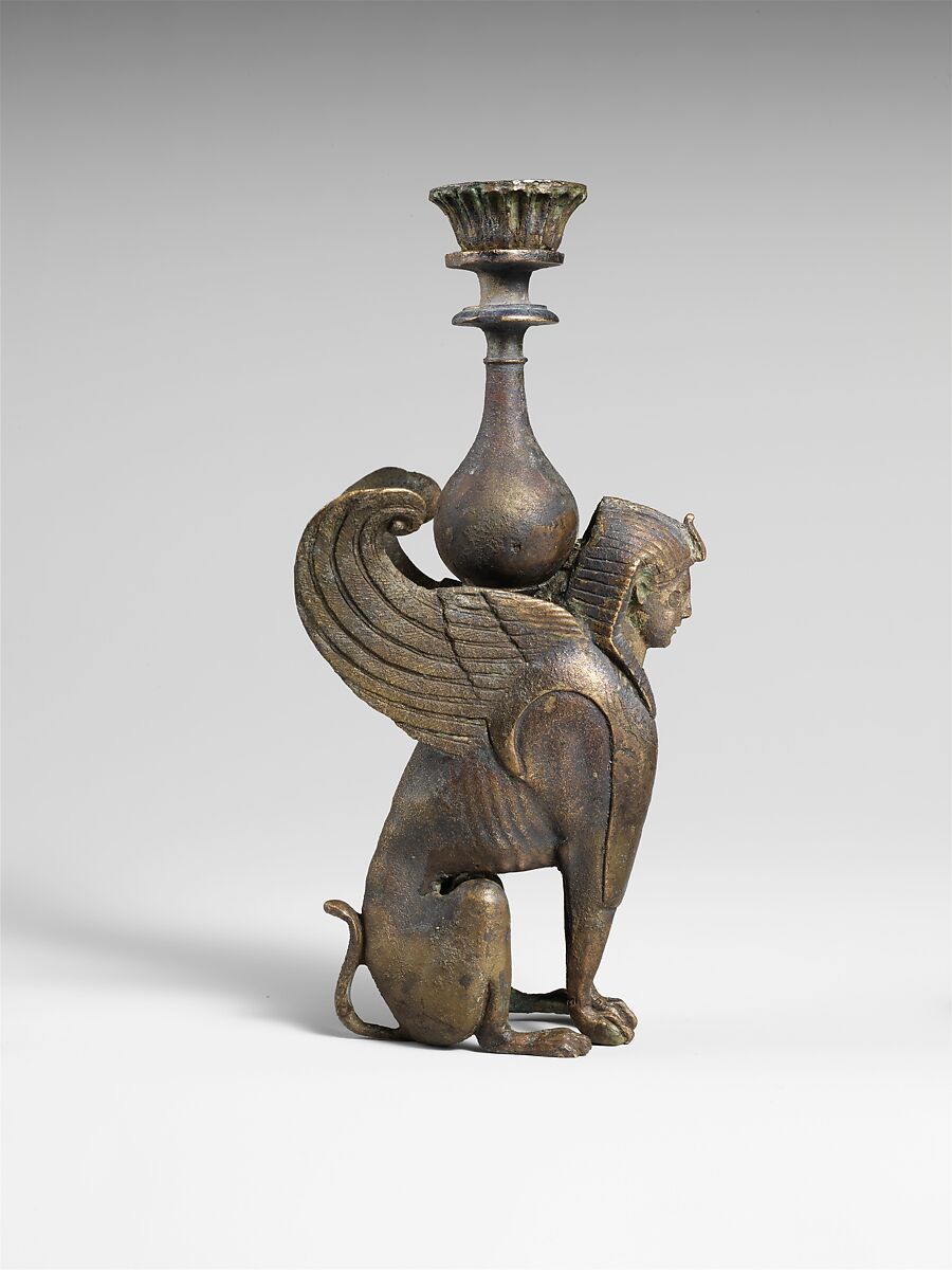 Bronze ornament in the form of a seated male sphinx, bronze, Roman