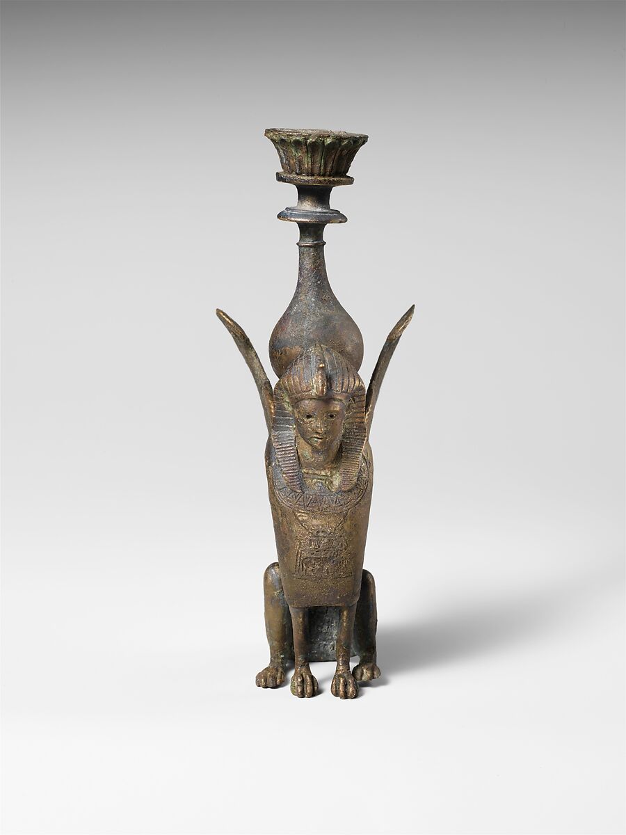 Bronze ornament in the form of a seated male sphinx, bronze, Roman