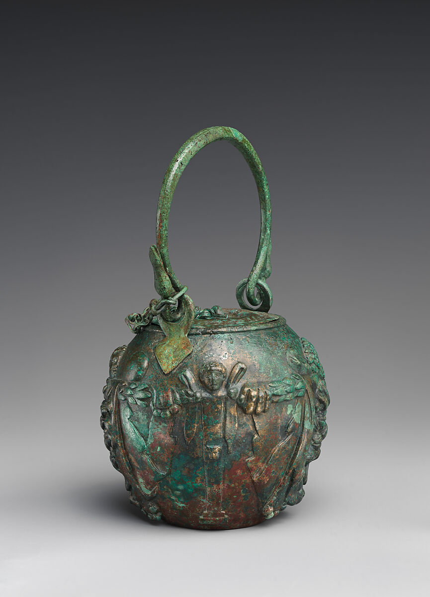 Bronze balsamarium decorated with lion-skins and herms, Bronze, Roman