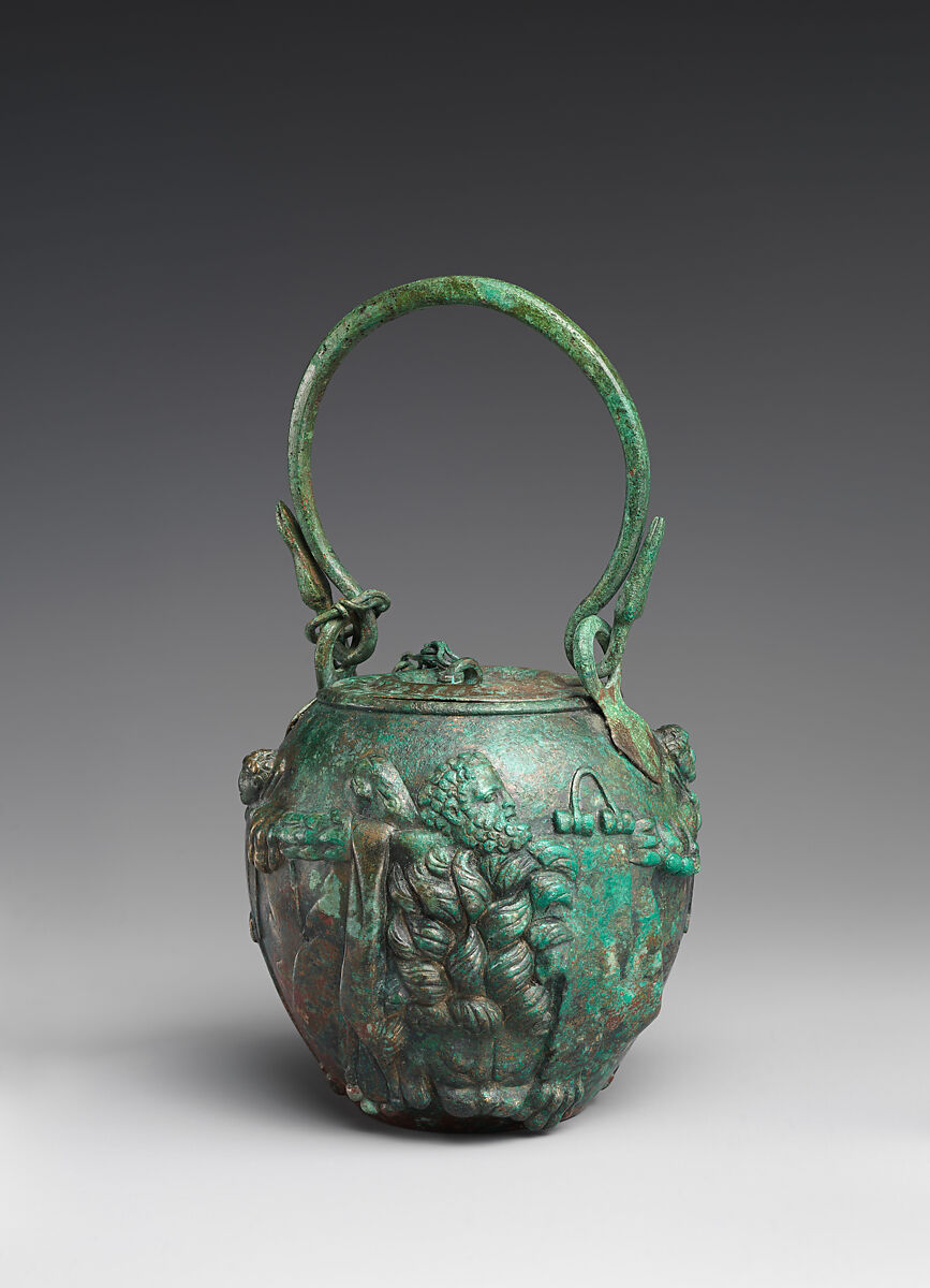 Bronze balsamarium decorated with lion-skins and herms, Bronze, Roman