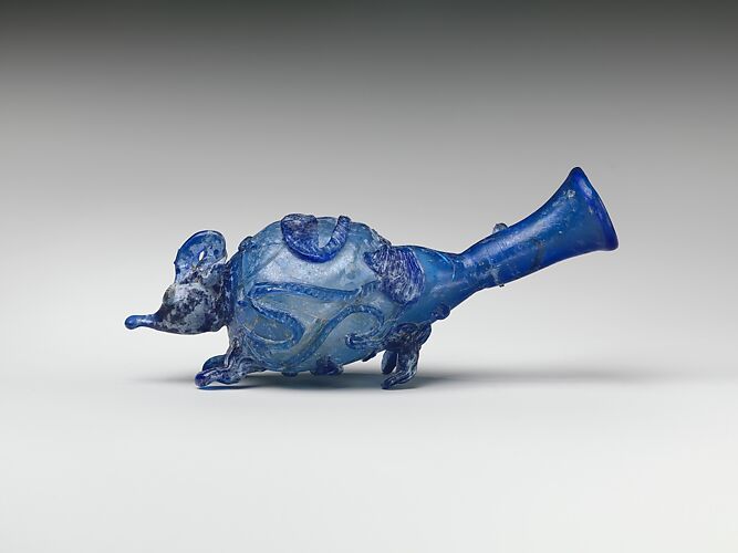 Roman bird-shaped glass vessels were used as perfume bottles. The liquid  was sealed inside the vessels and the tip of the tail had to be broken to  remove the perfume. The one