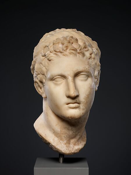 Marble head of a horned youth wearing a diadem | Greek | Hellenistic ...