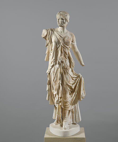 Statue of a female figure in archaistic style, Marble, Greek 