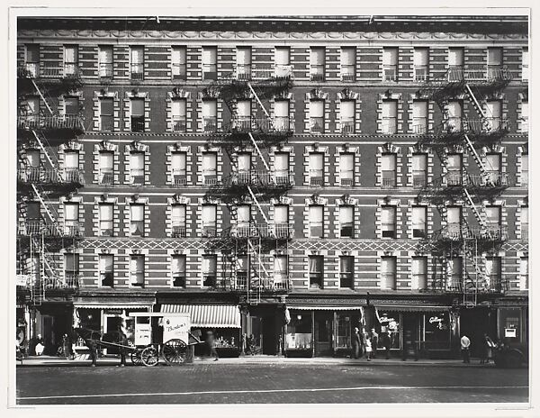 [Apartment Building Façade with Horse-Drawn Carriage, Sixth Avenue, New York]