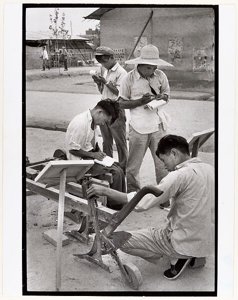Visitors take notes on a peasant invention at National Farm Implements Exhibit, Peking, Henri Cartier-Bresson (French, Chanteloup-en-Brie 1908–2004 Montjustin), Gelatin silver print 