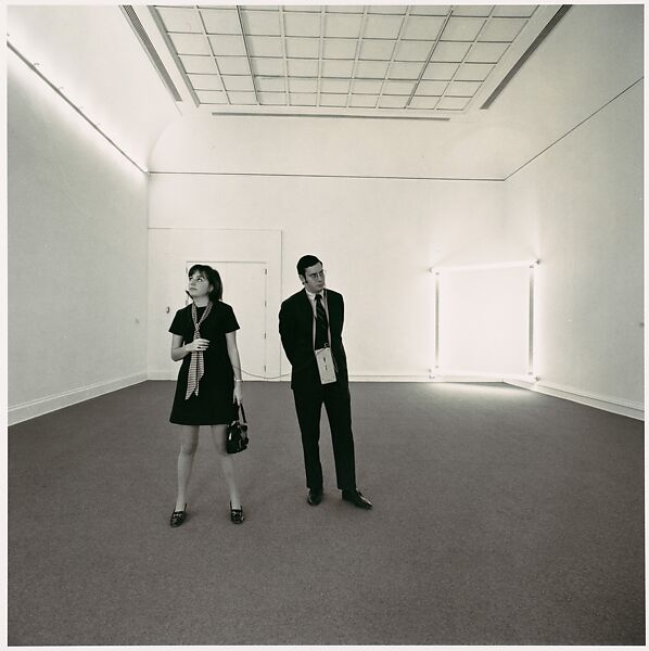 [Two Gallery-goers viewing Dan Flavin's work in the exhibition "New York Painting and Sculpture" at the Metropolitan Museum of Art], Bruce Davidson (American, born 1933), Gelatin silver print 