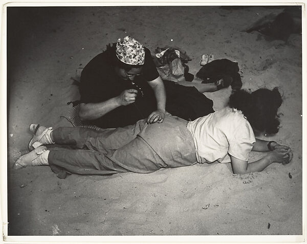 Mending, Coney Island, Weegee (American (born Austria-Hungary), Złoczów (Zolochiv, Ukraine) 1899–1968 New York), Gelatin silver print 