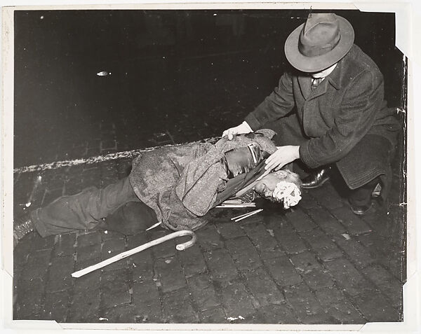 Tramp on Lower East Side Hit by a Taxi, Weegee (American (born Austria-Hungary), Złoczów (Zolochiv, Ukraine) 1899–1968 New York), Gelatin silver print 