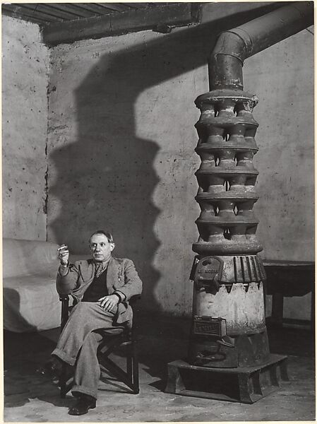 [Picasso Near the Stove in His Workshop, rue des Grands Augustins, Paris], Brassaï (French (born Romania), Brașov 1899–1984 Côte d&#39;Azur), Gelatin silver print 