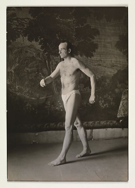 [Man in Briefs, Walking before Tapestry, Germany], August Sander (German, 1876–1964), Gelatin silver print 