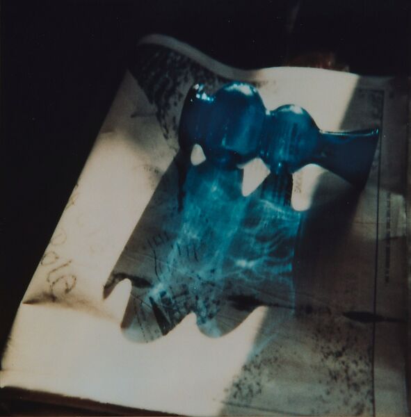 [Blue Vase Lying on Album Page in Sunlight], André Kertész (American (born Hungary), Budapest 1894–1985 New York), Silver dye bleach print 