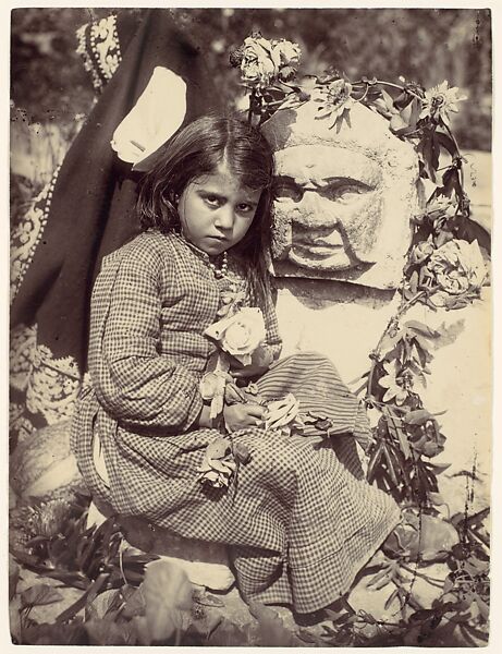 [Young Girl in Checked Dress with Roses, Sicily, Italy], Wilhelm von Gloeden (Italian (born Germany), 1886–1931), Albumen silver print from glass negative 